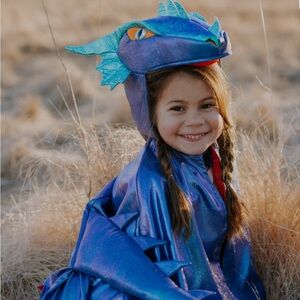 Dragon costume for Halloween party. Outfit includes cape from Great Pretenders.